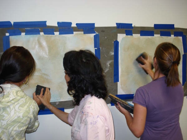 students painting color wash