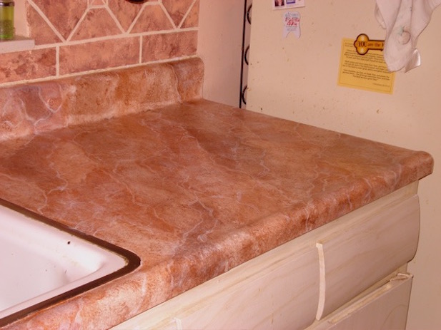Counter top with faux paint to look like Breccia Marble