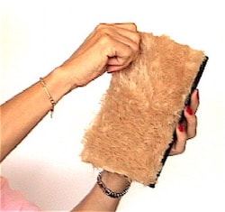 pulling fibers off poofy pad