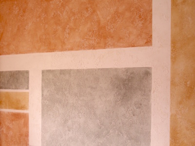 Faux painted wall with a venetian faux finish applied with just glaze